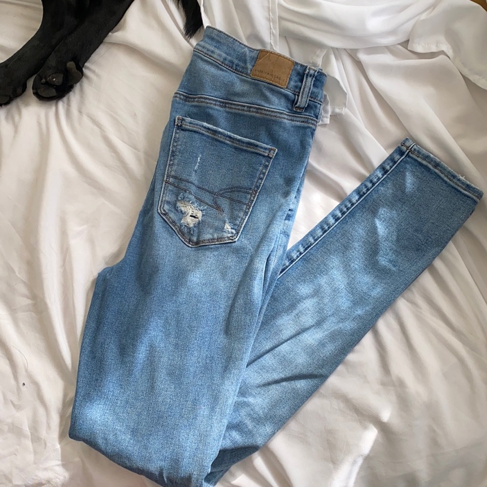 AE, highest rise jeggings 10 long, light wash and distressed.